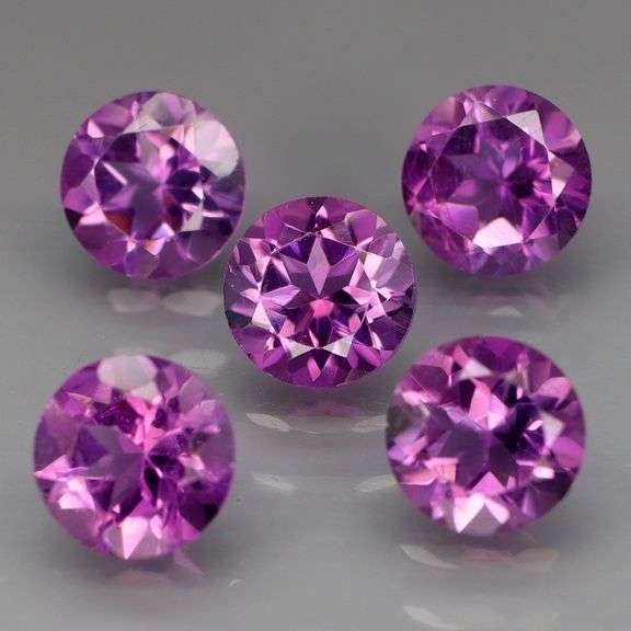 Glittering 5.76ct round cut Bolivian Amethyst set
