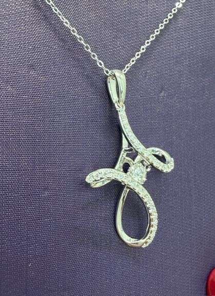 Beautiful Sterling silver with center dancing Moissanite necklace