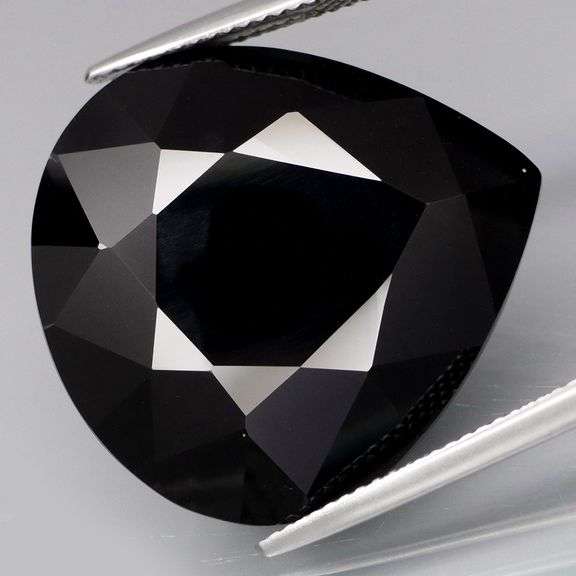 Huge collectors piece! 29.70ct silky black Loas Tektite