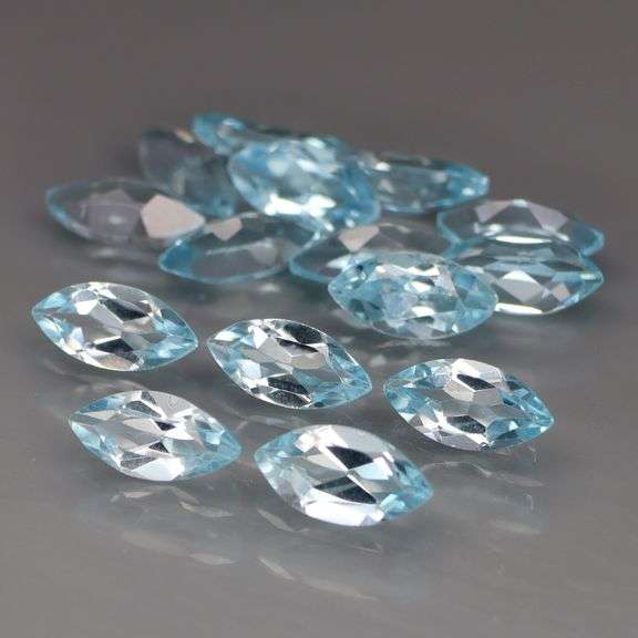 Brilliant! 9.10ct marquise cut Swiss blue Topaz set!
