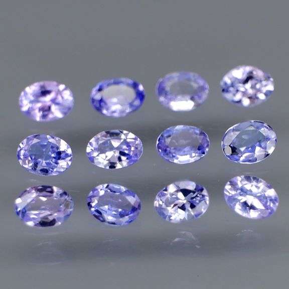 Glittering 1.84ct UNTREATED oval cut Tanzanite set