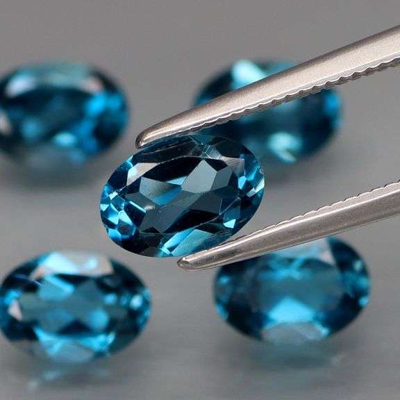 Pristine set of full fire London Blue Topaz weighing 4.78 carats!