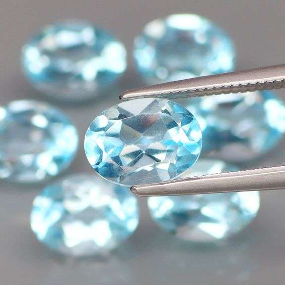 High fire and full of desire! Look at this vibrant 10.67ct Topaz set!