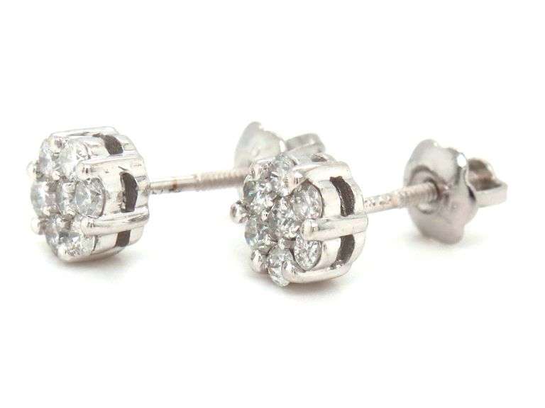 One pair of 14kt white gold 0.22ctw diamond cluster screw back earrings
