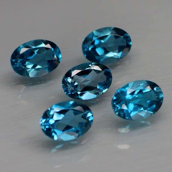Pristine set of full fire London Blue Topaz weighing 4.78 carats!