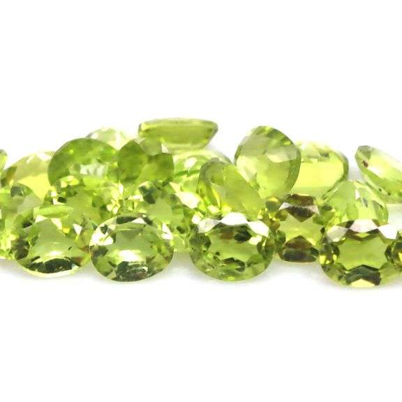 Dazzling 9.50ct untreated lime green Peridot set