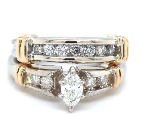 14kt White gold 0.70ctw marquise and round brilliant cut channel set diamond wedding set