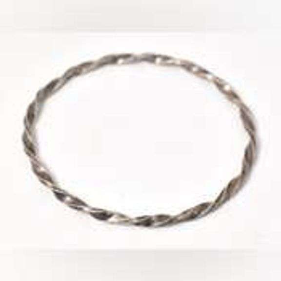 Twisted Bangle Bracelet in Sterling Silver.