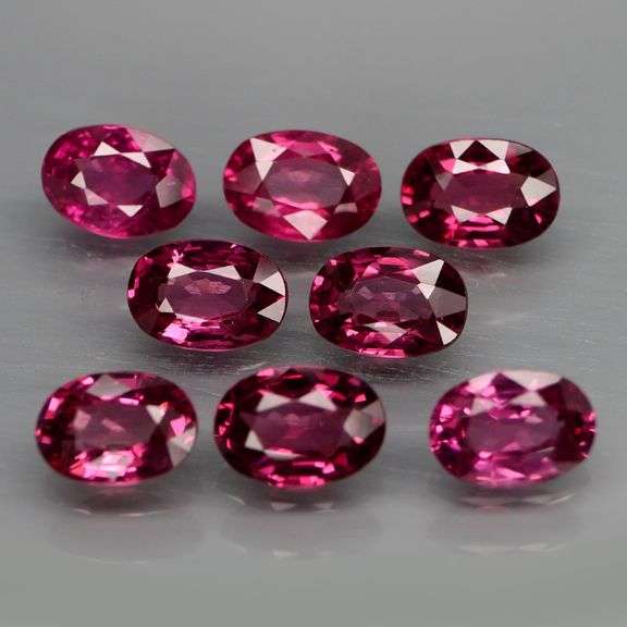 Rich 7.67ct oval cut violet pink Rodolite Garnet set