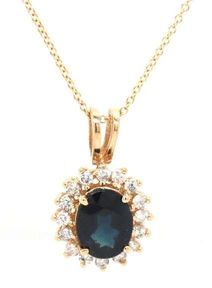 14kt Yellow gold oval blue sapphire and diamond halo pendant on chain