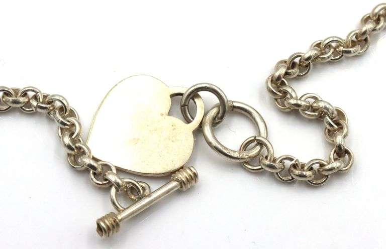 Vintage 925 Sterling silver necklace with heart shaped charm