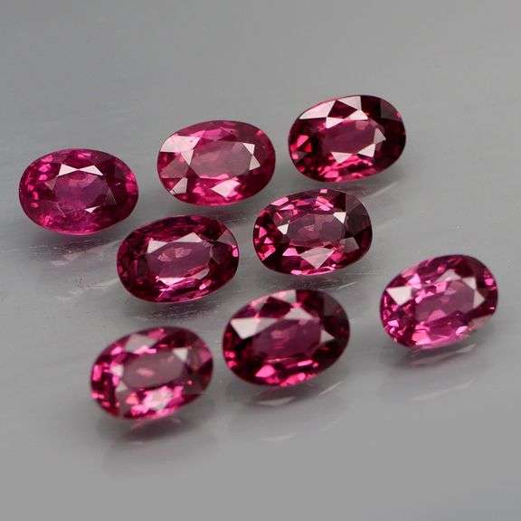 Rich 7.67ct oval cut violet pink Rodolite Garnet set