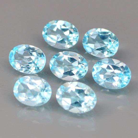 High fire and full of desire! Look at this vibrant 10.67ct Topaz set!