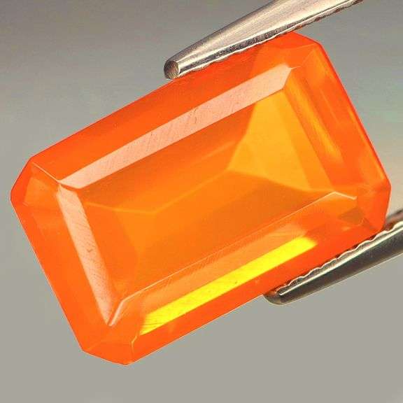 Holy cow! Look at that color! 4.63ct tangerine orange Fire Opal!