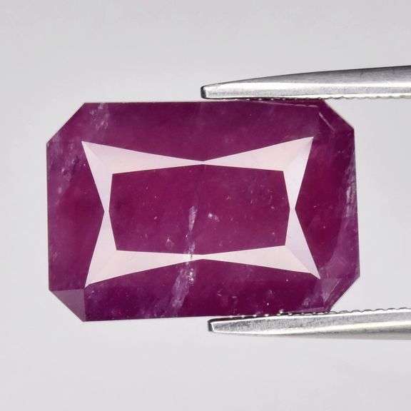 Simply amazing! 9.31ct collectors sized violet red Ginea Ruby!