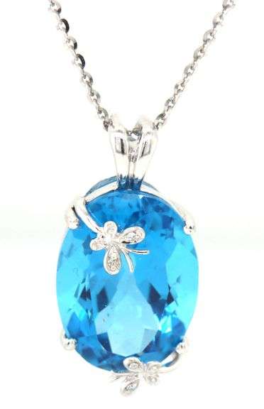 14kt White gold 16ct blue topaz and diamond accent pendant on chain