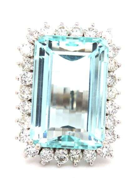 14kt White gold 22.93ct Emerald cut aquamarine and 1.75ctw diamond halo ring