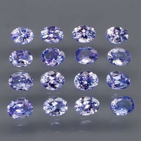 Heavy flashing 2.92ct oval cut Tanzanite set