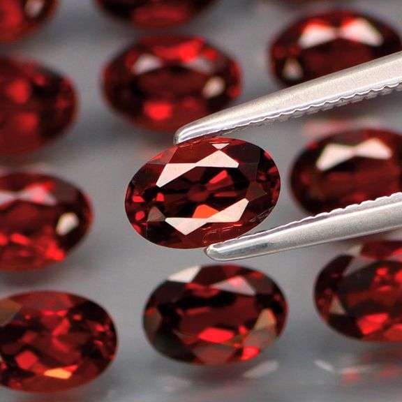 Premium 12.04ct oval cut cherry red Mozambique Garnet set!