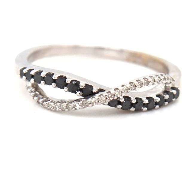 14kt White gold white and black diamond crossover ring
