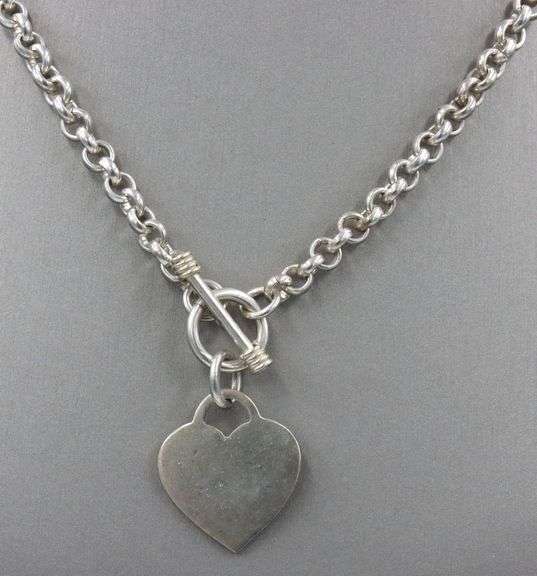 Vintage 925 Sterling silver necklace with heart shaped charm