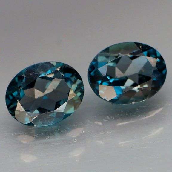 Glittering VS grade 4.65ct pair of London blue Topaz!