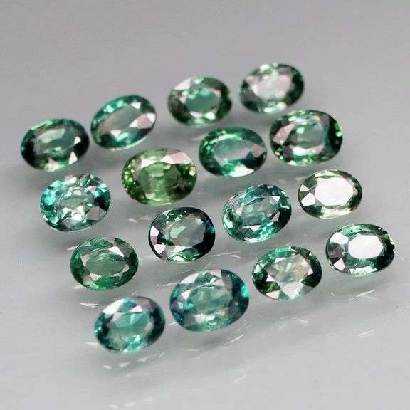 Heated only! 3.19ct blue green Sapphire set