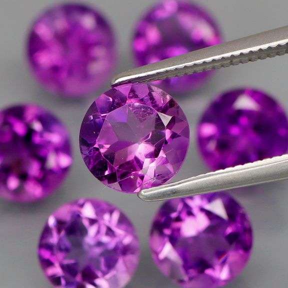 Top grade! 8.60ct round cut Bolivian Amethyst set!