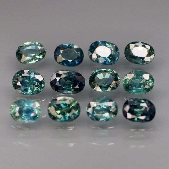 Heated only! 3.47ct bright blue green Sapphire set!