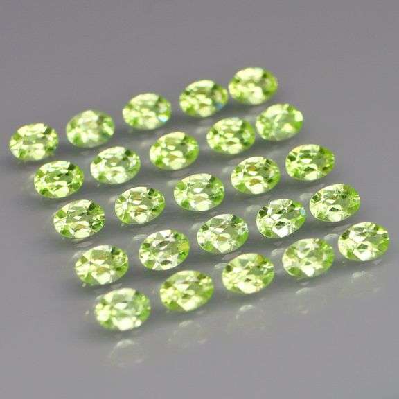 Dazzling 4.40ct untreated apple green Peridot set