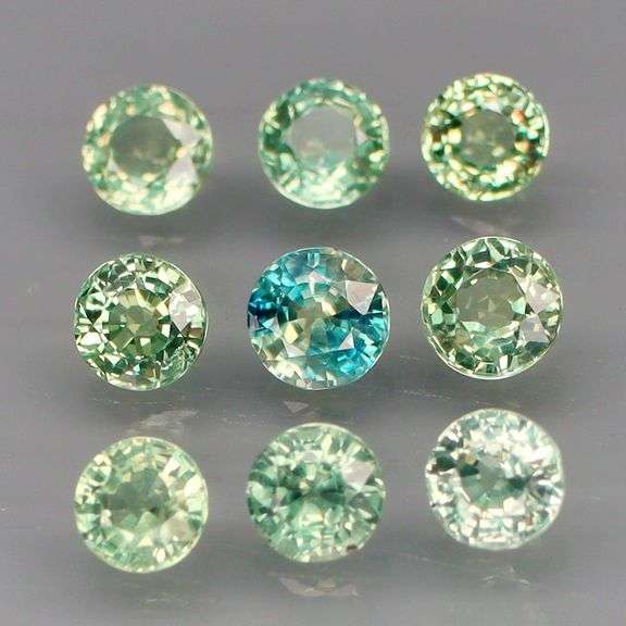 Exotic 2.70ct 9pc single vein blue green Sapphire set