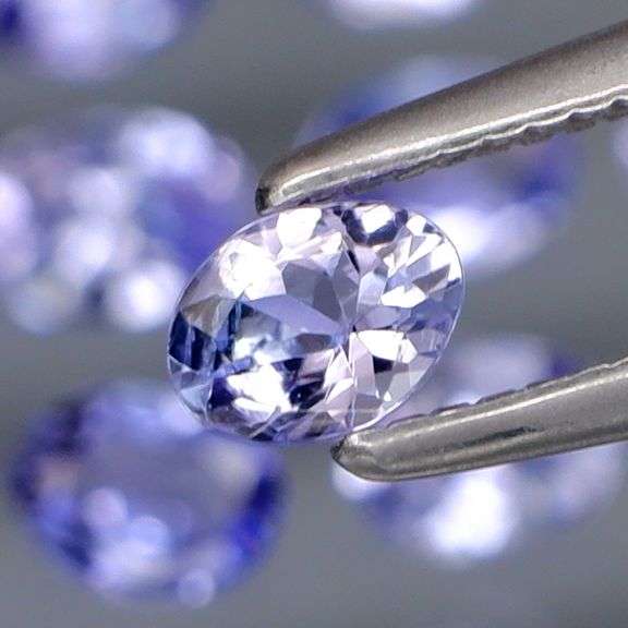 Glittering 1.84ct UNTREATED oval cut Tanzanite set