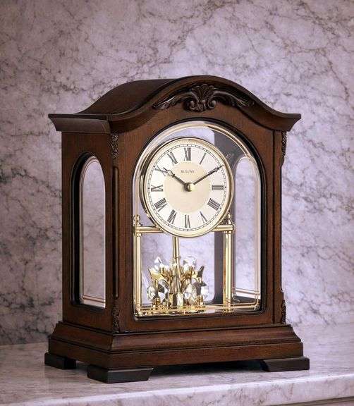 Bulova Clock Walnut Finish with Revolving Pendulum