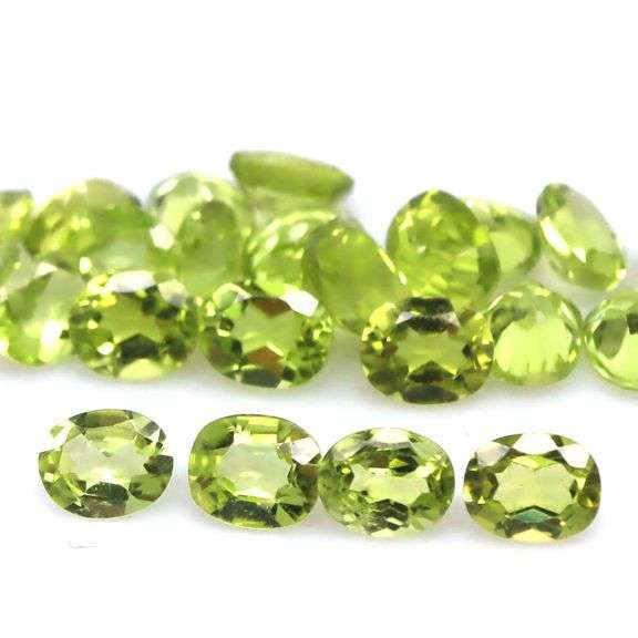 Dazzling 9.50ct untreated lime green Peridot set