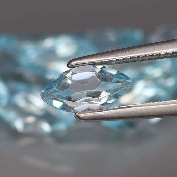 Brilliant! 9.10ct marquise cut Swiss blue Topaz set!