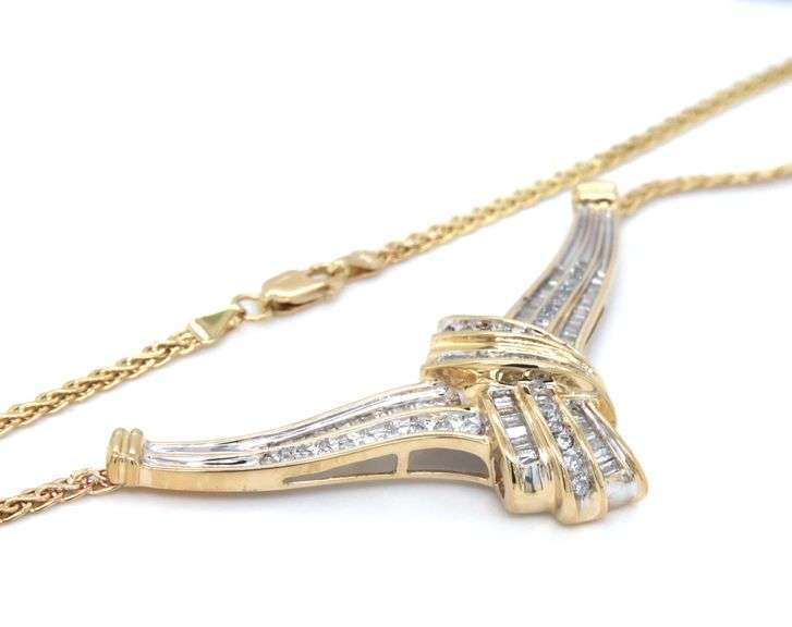 14kt Yellow gold baguette and round diamond V necklace