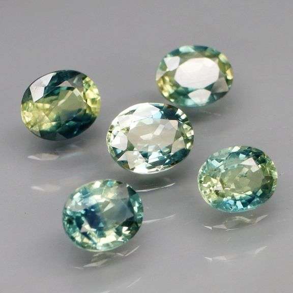 Vibrant 3.13ct blue green Australian Parti Sapphire set