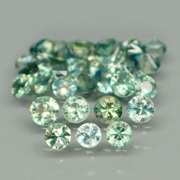 Exotic 4.01ct 35pc single vein bright blue green Sapphire set