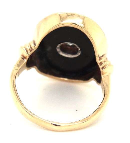 10kt Yellow gold 0.50ct European cut diamond and black onyx ring