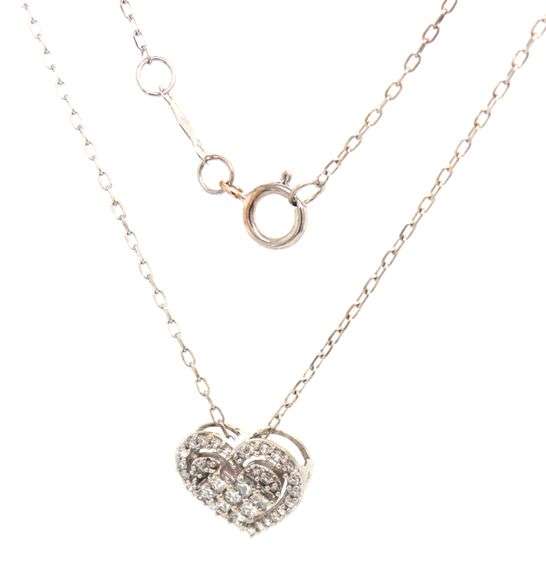 10kt White gold diamond cluster heart shaped pendant on chain