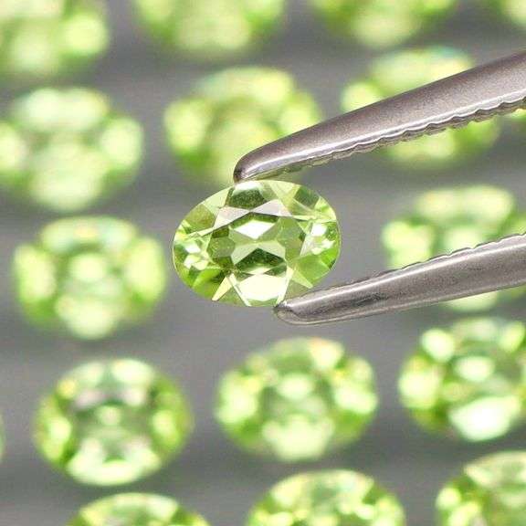 Dazzling 4.40ct untreated apple green Peridot set
