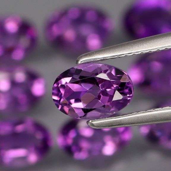 Top grade! 6.20ct oval cut Bolivian Amethyst set
