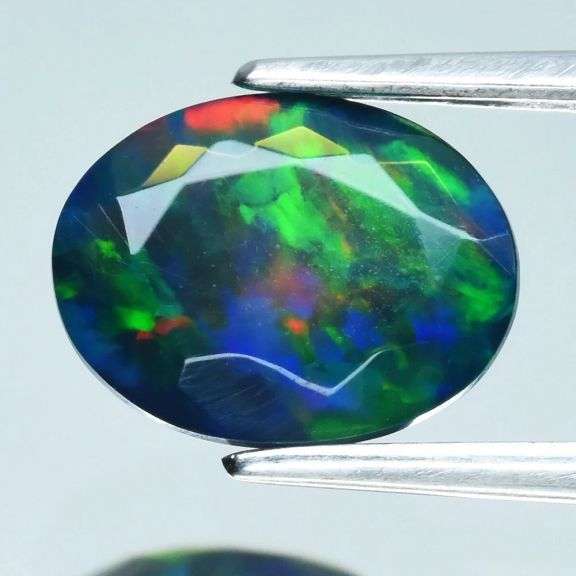 Full rolling patterns! Fully faceted! 1.16ct Black Opal!