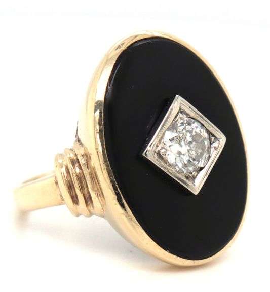 10kt Yellow gold 0.50ct European cut diamond and black onyx ring