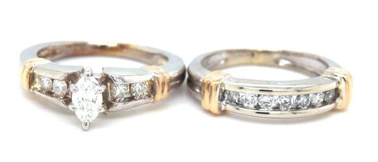 14kt White gold 0.70ctw marquise and round brilliant cut channel set diamond wedding set