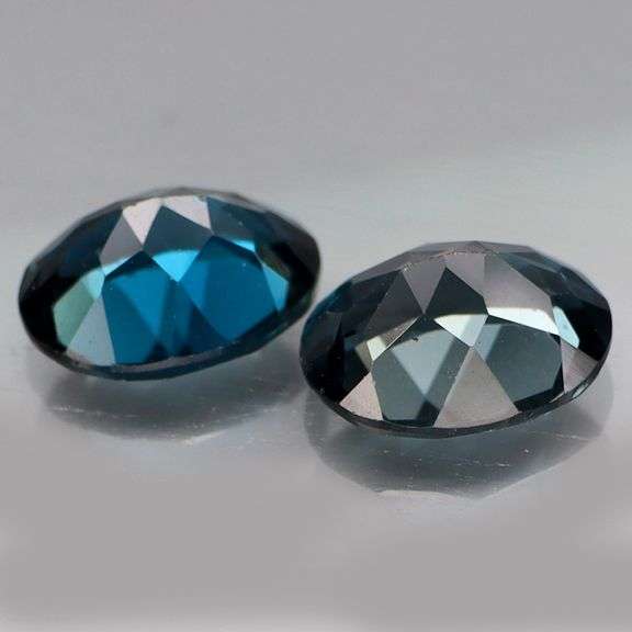 Glittering VS grade 4.65ct pair of London blue Topaz!