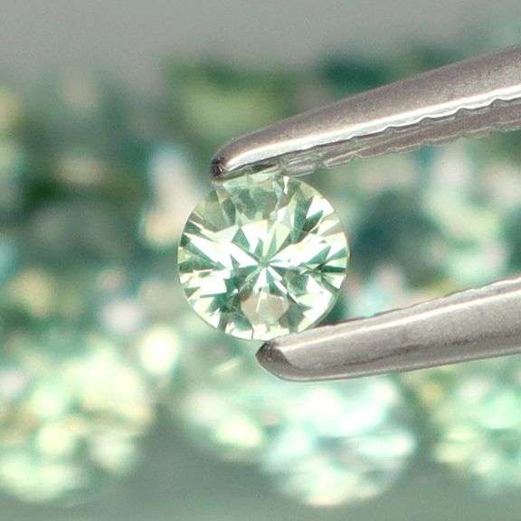 Exotic 4.01ct 35pc single vein bright blue green Sapphire set