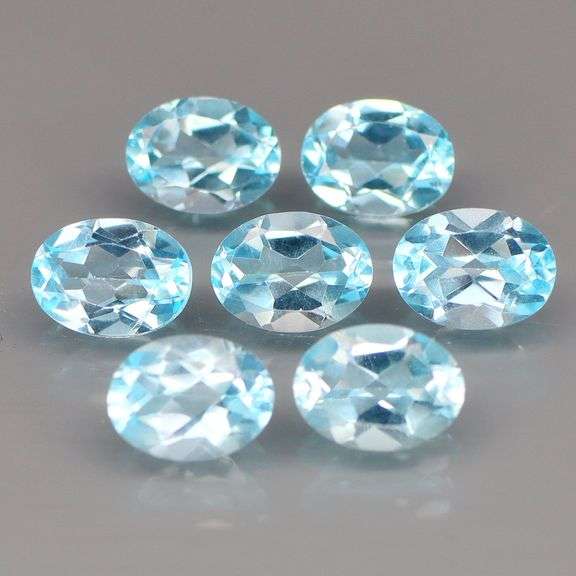 High fire and full of desire! Look at this vibrant 10.67ct Topaz set!