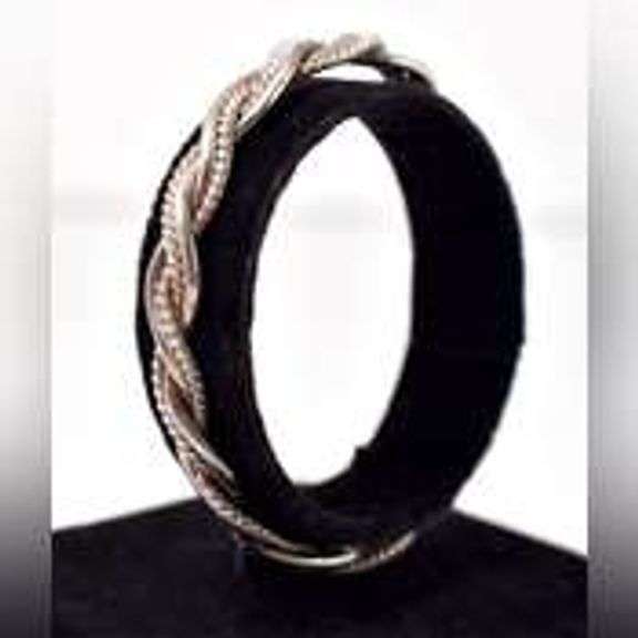 Braided Twist Cuff Bracelet in Sterling Silver.