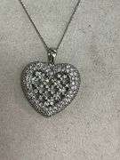 CERTIFIED 14K WHITE GOLD AND DIAMOND HEART PENDANT